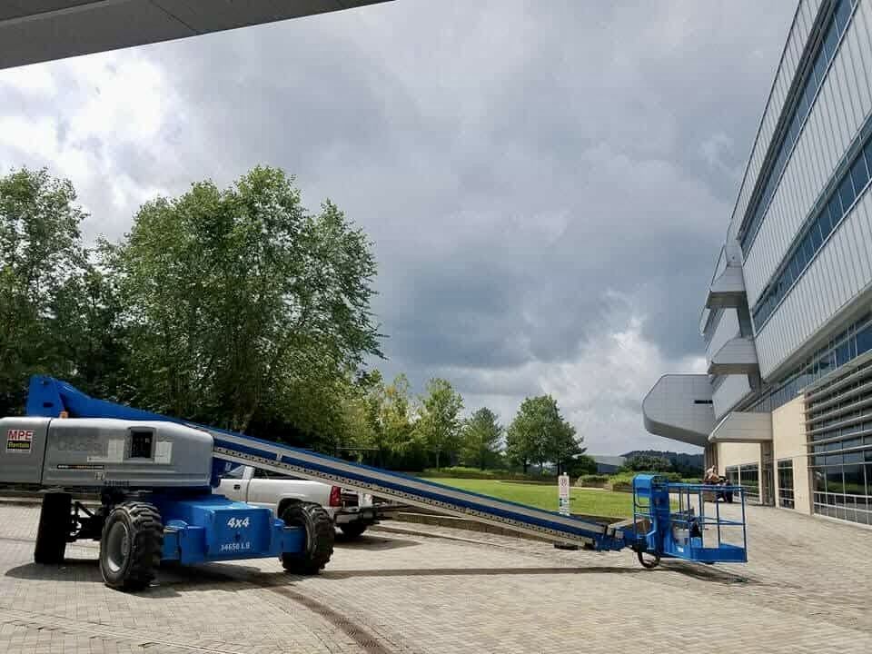 Window cleaning professional with equipment